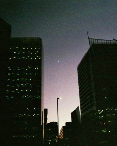 Sundown through the buildings of London.